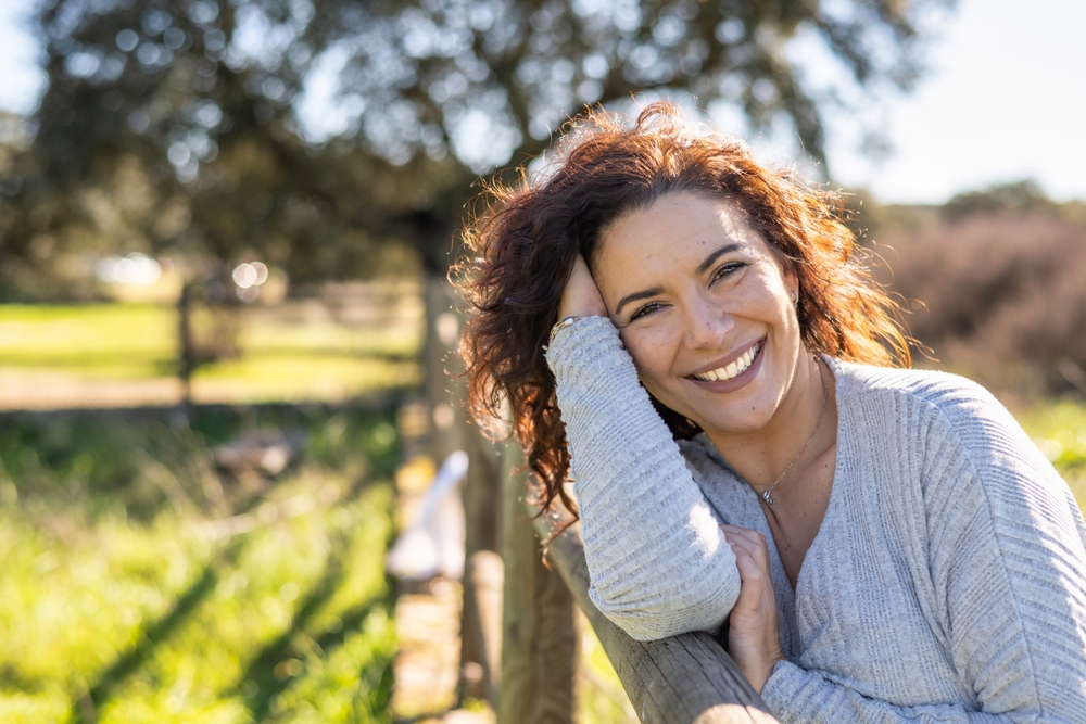 Smiling woman outdoors